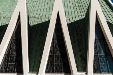 a green roof with a triangular window
