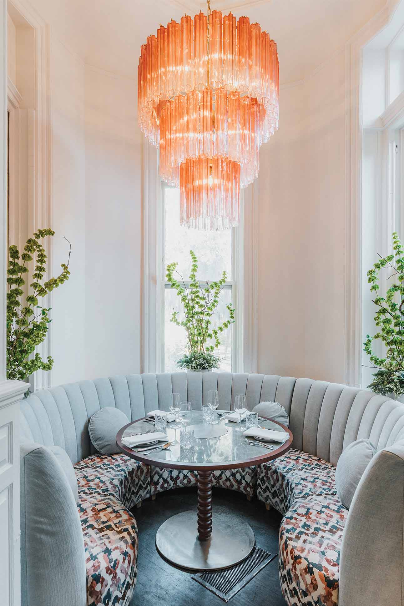 interior of a restaurant in savannah with an opulent chandelier