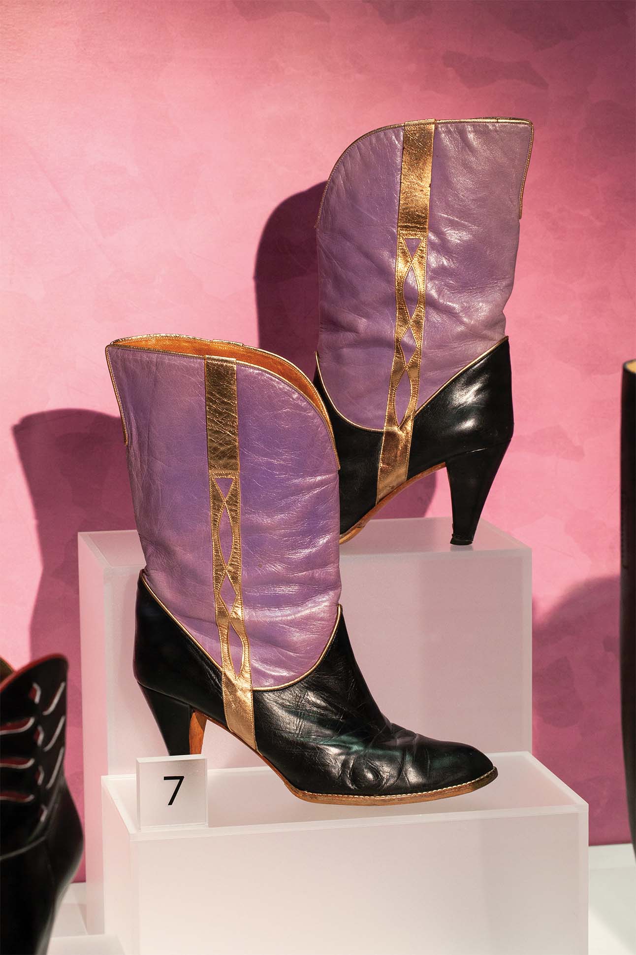 purple shoe pair being displayed